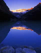 Dawn reflections on Lake Louise, Banff National Park, Alberta, Canada. August 2005