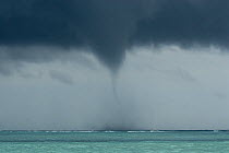 Water Spout and storm over the ocean, Tubbataha Reef, Palawan, Philippines.