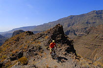 Cyclist in the Barranco de Tirajana, Gran Canaria Island, the Canary Isles, Spain, September 2007