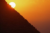 Sun rising over pyramid, Giza, Egypt, 1997
