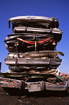 Stack of crushed cars ready for recycling, USA, 1997