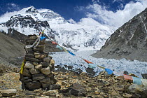 Rock pile and prayer flags with Mount Everest and Rongbuk Glacier, Tibet, June 07, 'Wild China' series