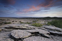 View over granite rocks onto the dryland landscape of Hombrados. Guadalajara, Spain