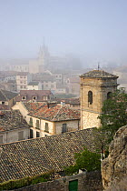 View over the rooftops of Niebla town on a foggy day, Molina de Aragon, Guadalajara, Spain