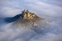 Hohenzollern castle emerging from the mist, Baden-wuerttemberg, Germany