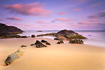 Rocks in the sand, Playa (beach) de los Negretes, Calblanque, La Manga, Murcia, Spain