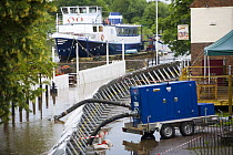 Temporary flood barriers and pumping machine erected at Upton-on-Severn, Worcestershire, June 2007