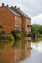 Flooded street at Upton-on-Severn with a small punt outside, Worcestershire, June 2007