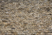 Traditional Cotswold stone roof with small tiles at the top and larger at the bottom. Oxfordshire, UK