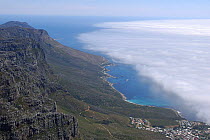 Aerial view of Table Mountain and coast, with clouds rolling in, South Africa