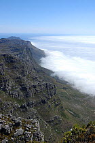 Aerial view of Table Mountain with clouds rolling in off coast, South Africa