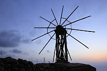 Old wind mill at sunset on the Coast of Hiscaguan, La Palma, Canary Islands