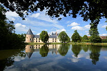 Castle of Chamerolles reflected in its lake in the Loire Valley, France