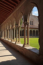Archways and courtyard of the Abbey of St Hilaire, France
