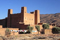 Clothes drying outside the walls of the Kasbah of Timidarte, Drâa Valley, Morocco December 2007