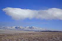 Clouds at dawn near Shuanghu town in Tibet's Chang Tang Nature Reserve. As the second largest Nature Reserve on earth, it is China's greatest natural asset. December 2006