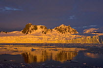Sunset over the frozen landscape of the western Antarctic peninsula
