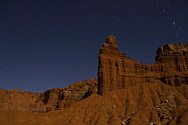 Chimney Rock at night, under moonlight and star trails, Capitol Reef National Park, Utah, USA
