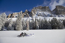 Snowmobile in the Shoshone National Forest near Dubois, Wyoming, USA, Model released