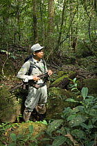 Guard on anti-poaching patrol in Preah Monivong Bokor National Park, Elephant Mountains, south-western Cambodia (formerly Kampuchea)