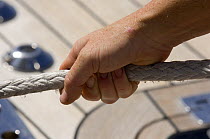 Holding a rope onboard SY "Adele"