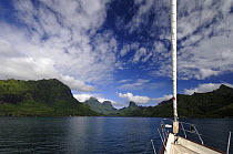 SY "Adele", 180 foot Hoek Design, approaching a volcanic island in French Polynesia Non editorial uses must be cleared individually.