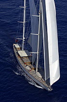 Aerial view of SY "Adele", 180 foot Hoek Design, underway close to Huahine Island, French Polynesia, 2006.  Non editorial uses must be cleared individually.