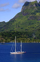 Aerial view of SY "Adele", 180 foot Hoek Design, motoring off an island in French Polynesia, 2006.  Non editorial uses must be cleared individually.