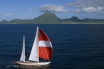 Aerial view of SY "Adele", 180 foot Hoek Design, underway off Bora Bora Island, French Polynesia, 2006.  Non editorial uses must be cleared individually.