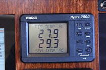 Digital barometer onboard SY "Adele" showing the air and sea temperature whilst sailing in French Polynesia, 2006.