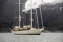 SY "Adele", 180' Hoek Design, anchored against the steaming volcanic shore line at Pendulum Cove, Antarctic Peninsula, Deception Island, January 2007  Non editorial uses must be cleared individually.