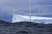 SY "Adele", 180 foot Hoek Design, exploring a tabular iceberg in rough sea, Bransfield Strait, 17 January 2007 Non editorial uses must be cleared individually.