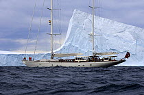 SY "Adele", 180 foot Hoek Design, explores a tabular iceberg in the Bransfield Strait, Antarctica, January 2007. Non editorial uses must be cleared individually.