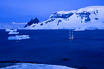 SY ^Adele^ at anchor near Danco Island in the Errera Channel, Antarctica, January 2007~ Non editorial uses must be cleared individually.