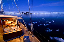 Evening light on the deck of SY "Adele", 180 foot Hoek Design, in Yankee Harbour, Antarctica, January 2007 Non editorial uses must be cleared individually.