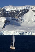 SY "Adele", 180 foot Hoek Design, motoring near Danco Island, Errera Channel, Antarctica, January 2007 Non editorial uses must be cleared individually.