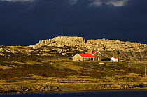 Dramatic light hits the coast to the east of Port Stanley, Falkland Islands, January 2007