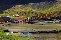 The abandoned Grytviken whaling station, with the restored church and museum in the background. South Georgia, February 2007
