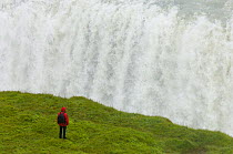 Person watching Gulfoss waterfall, Iceland