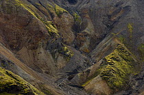 Stream meandering though barren landscapes of Landmannalaugar highlands, central Iceland