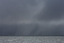 Stormy skies over the sea in the bay of Husavik, north Iceland