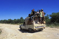 Taxi-brousse transporting people on small road, South Madagascar