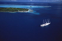Aerial view of Luxury cruise ship in the lagoon at Bora Bora Island, Society Islands, French Polynesia, June 2002.