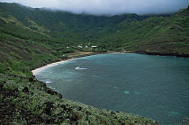 Small bay and village, Ua Huka Island, Marquesas Islands, French Polynesia.