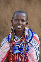 Portrait of a Masai woman adorned with bead work, Kenya