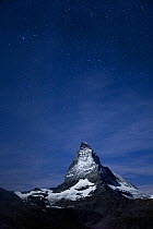 The Matterhorn (4478m) at night with stars, Switzerland
