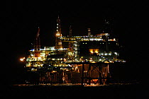 Lights illuminate Claymore production platform at night, which is situated 100 miles north east of Aberdeen, March 2008