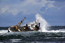 The fishing vessel Sovereign battles waves in the rough North Sea on the approach to Fraserburgh harbour, March 2006