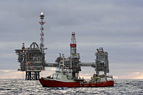 The stand-by vessel Grampian Monarch in front of the Bruce oil production platfom, operated by BP, situated in the North Sea 100 miles east of the Shetland Islands, May 2006