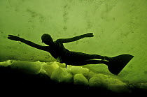 Julia Petrik  free-diving (without air supply) under the ice in the White Sea, Northern Russia March 2008